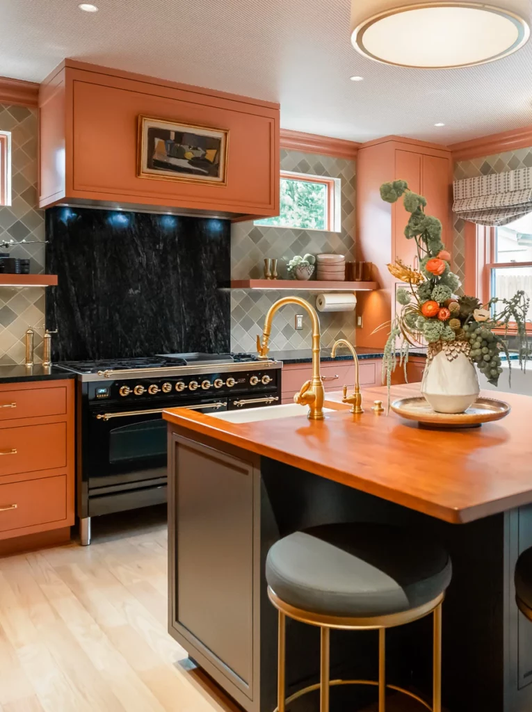 Kitchen with honey-color cabinets and middle island