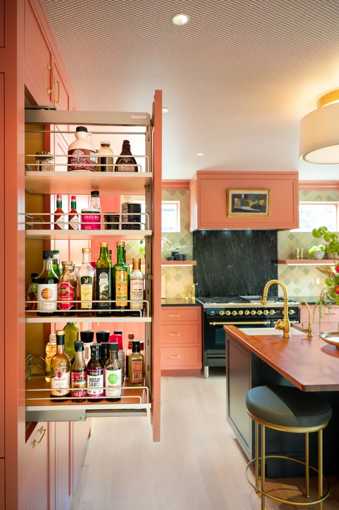 Kitchen remodel showing slide out shelving and center island